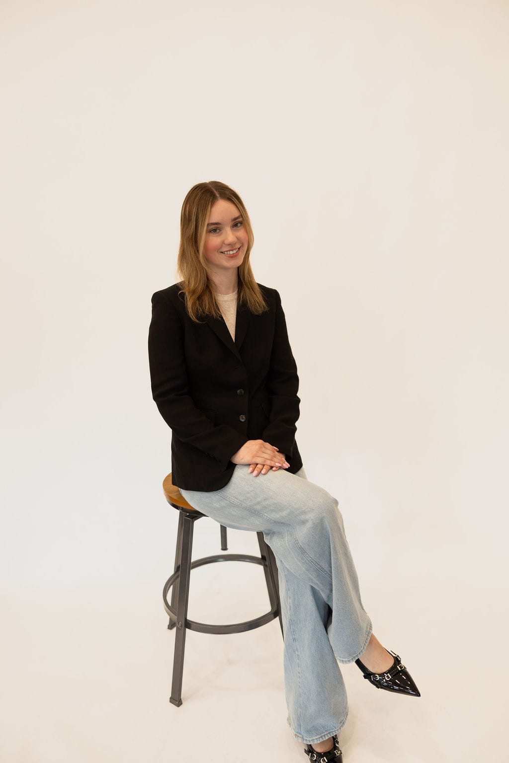 Maigan Dowell, owner of DO-WELL Cleaning West Chester Branch, smiling and professional